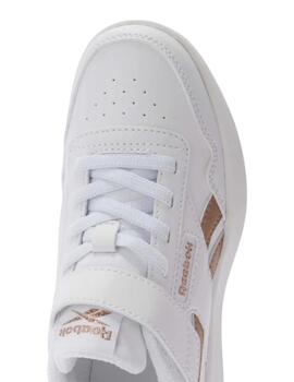 Zapatillas reebok court advance elastic blanco dorado niña.