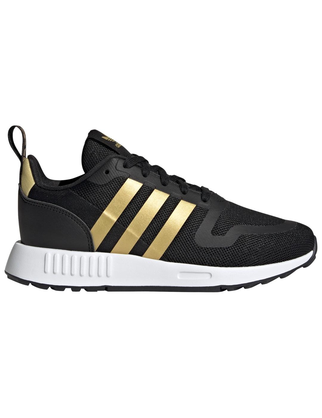 Grave Cha Indulgente Zapatillas adidas multix j negro dorado de niño.