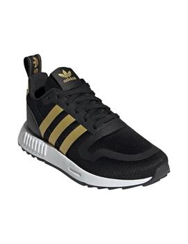 Zapatillas adidas multix j negro dorado de niño.