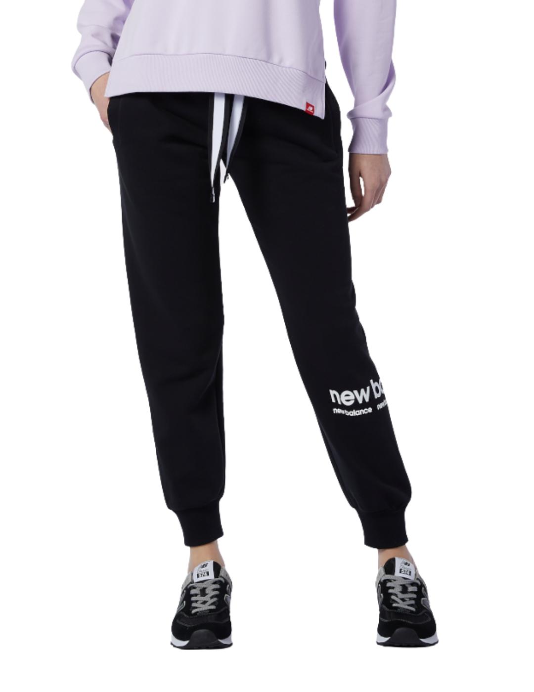 pantalon New Balance essentials id swtp negro de mujer.