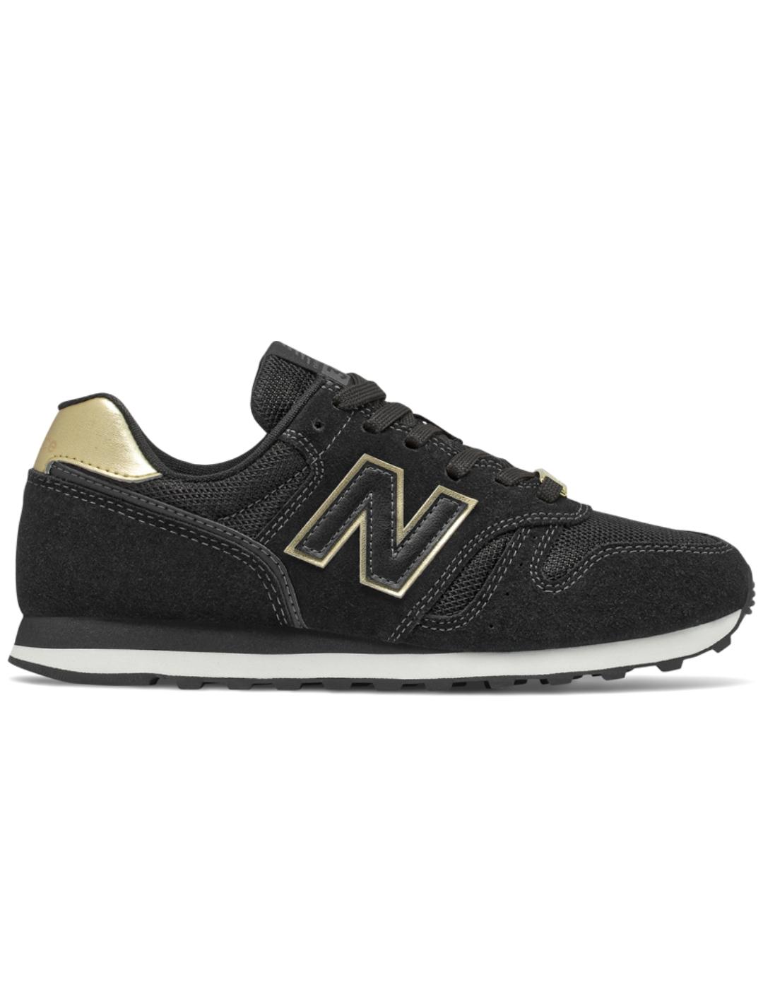 Zapatillas New Balance 373 negro dorado mujer.