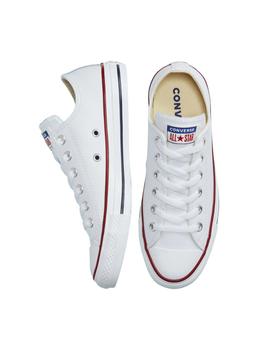 Zapatillas converse all star bajo piel blanco de mujer.