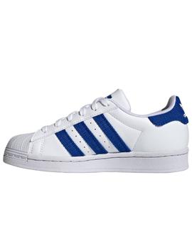 Zapatillas adidas superstar j blanco azul de niño.