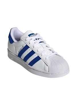 Zapatillas adidas superstar j blanco azul de niño.