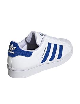 Zapatillas adidas superstar j blanco azul de niño.